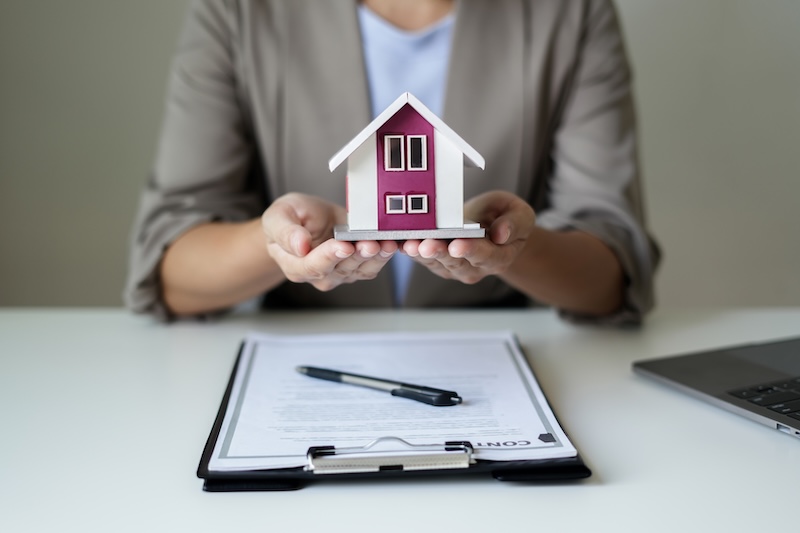 Real estate concept Home insurance, loans and home rentals.