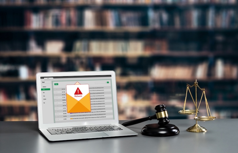 Cyber attacking concept. Malware alert showing on computer screen display scam and threat detection on computer system or online server to be removed brisk.