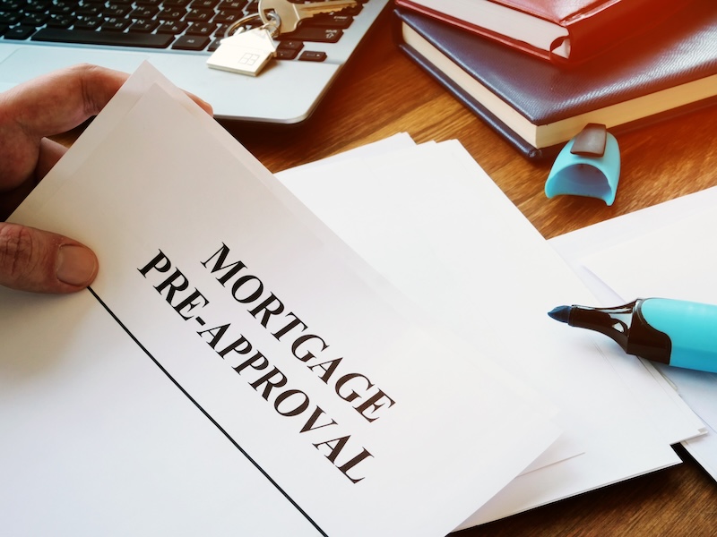Mortgage pre-approval documents in the office.