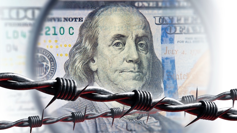 Dollar behind barbed wire. Sanctions for blocking money concept. Fragment of dollar bill. Barbed wire is metaphor for restrictions on use. Ban on using dollar. Refusal from USD. 3d image